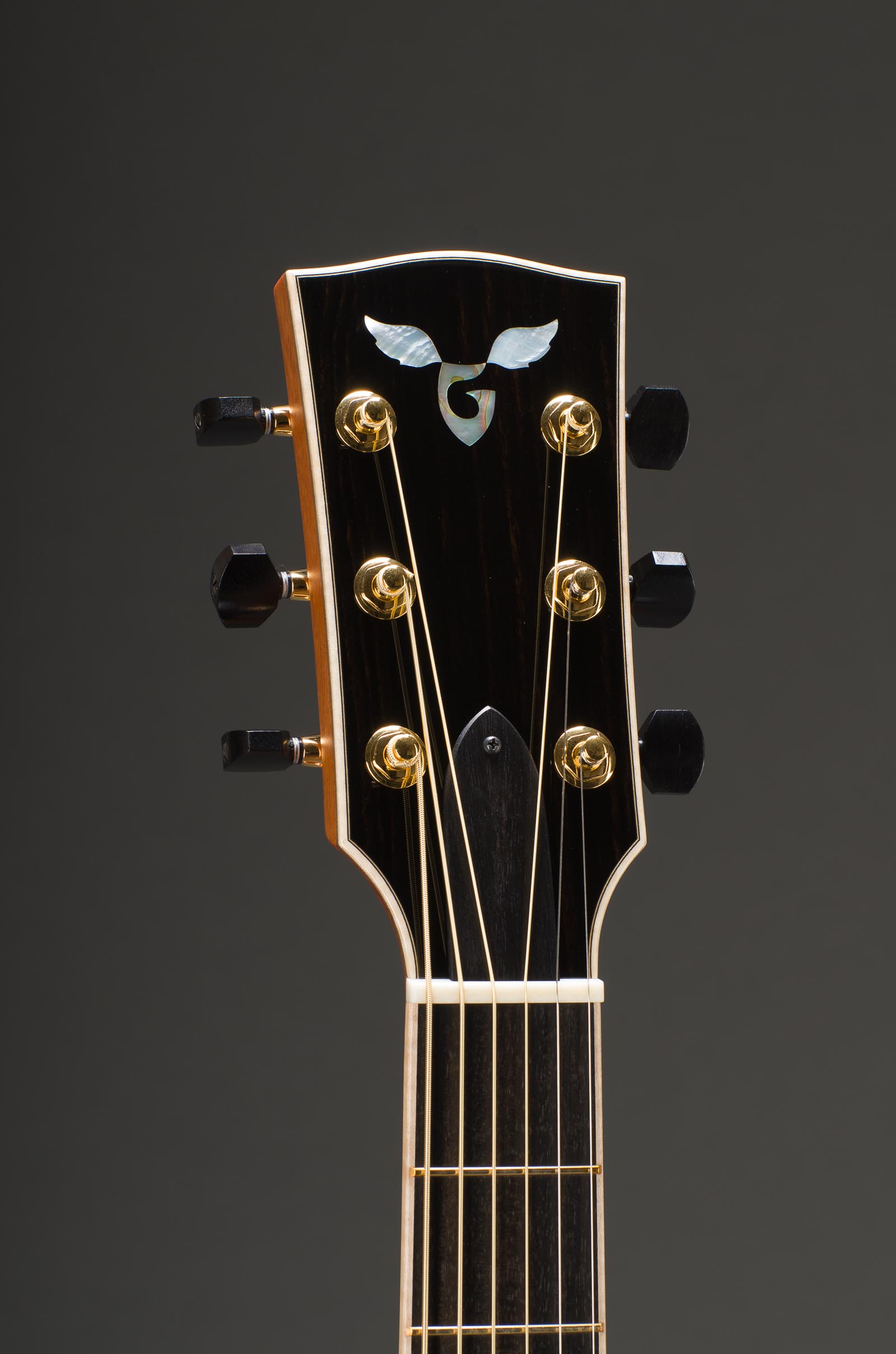 Signature Series Peghead - Modern Styling with Ebony Veneer, Curly Maple Binding, Abalone G and MOP WIngs, Gold Gotoh 510 Mini tuners with ebony buttons