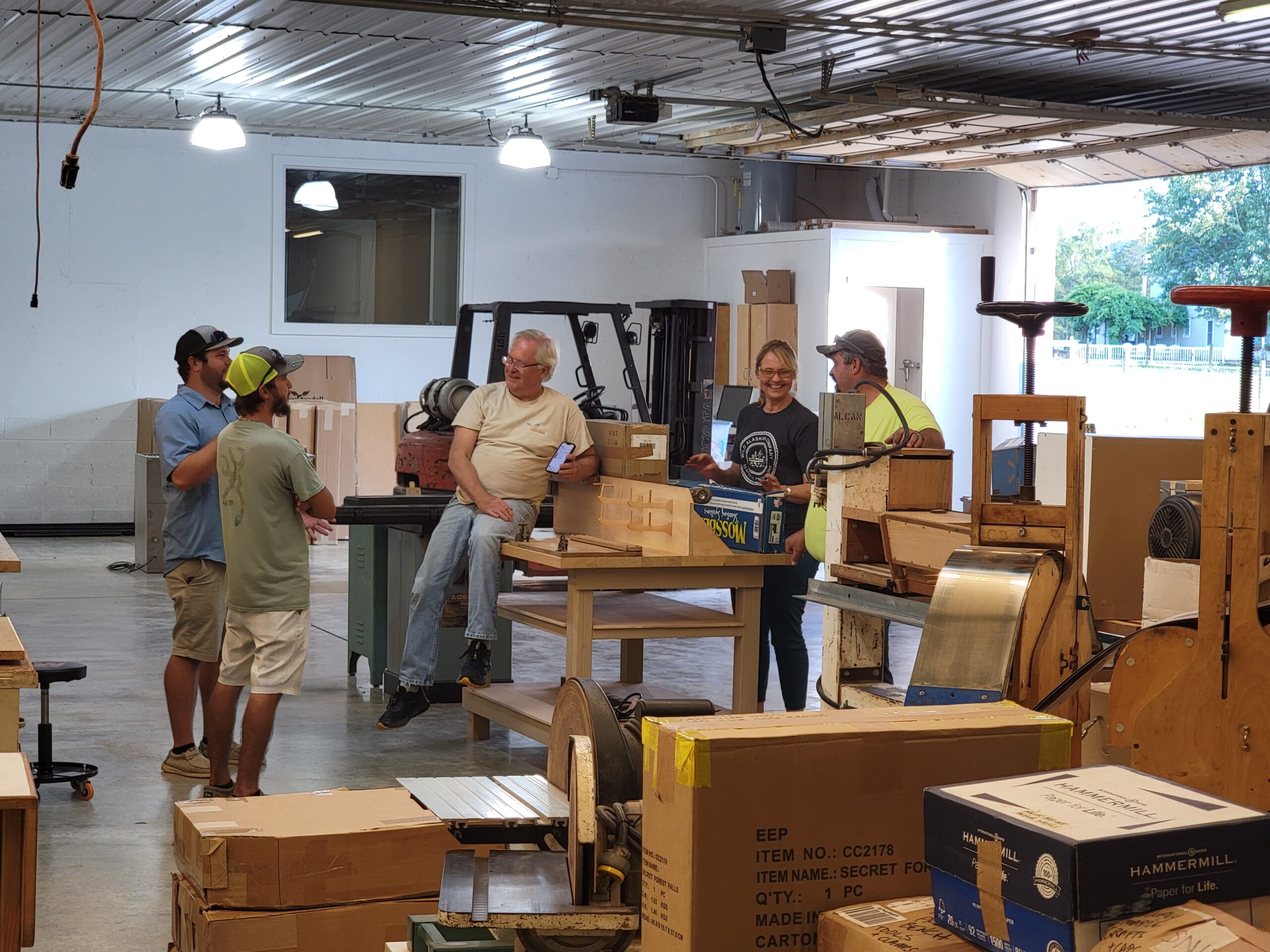 James & Jean working with our local contractor to set up the new shop.